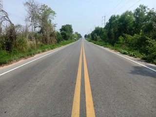 Asphalt roads in Thailand and yellow traffic lines