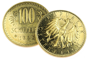 Austrian 100 Schilling gold coins isolated on white background