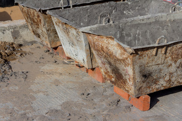 Clean concrete bucket for receiving concrete at a construction site. Concrete bucket for wet...