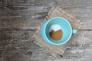 cup of coffee on wooden table