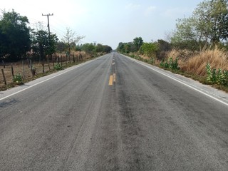 Asphalt roads in Thailand and yellow traffic lines