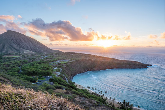 Hanama Bay sunrise - orange - golden hour - over pacific ocean