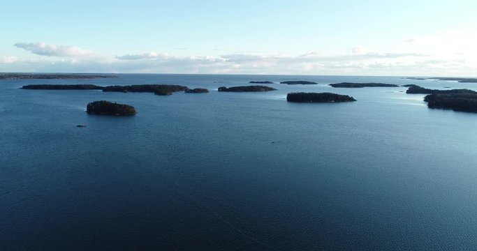 Aerial view of Rocky islands in baltic sea near Helsinki. Sunset time. Spring in Finland.