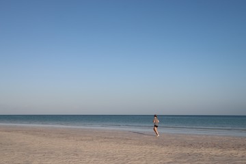 corriendo en la playa