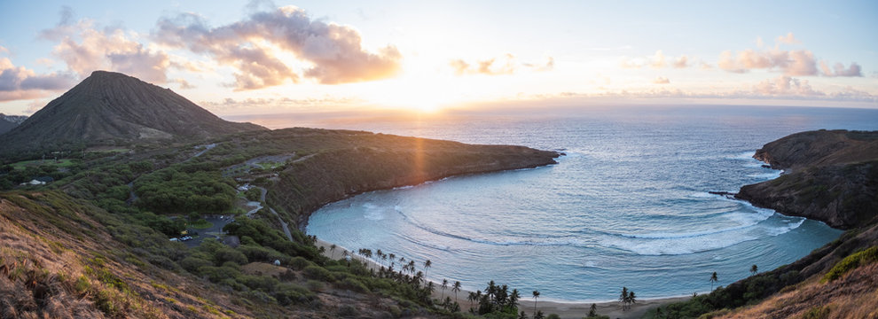 Hanama Bay sunrise - orange - golden hour - over pacific ocean