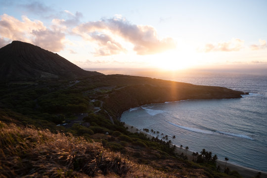 Hanama Bay sunrise - orange - golden hour - over pacific ocean