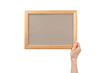 Female hands holding photo frame with copy space isolated on white