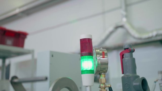 Warning lamp with pressure gauge on autoclave production equipment