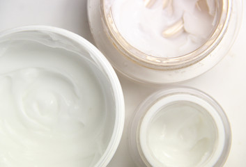 Obraz na płótnie Canvas Mix of face creams for beautiful skin