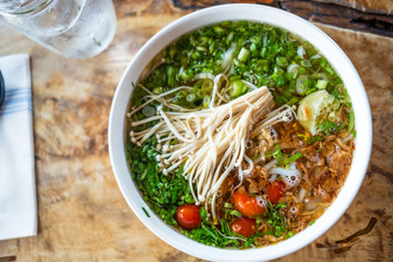 Vegetarian Thai noodle - enoki mushroom toppings, fried onion