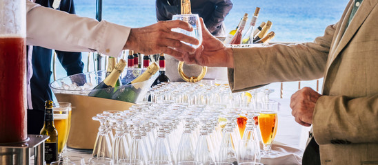 Cocktail event drinks exchange from barman to client - concept of party like wedding and people...