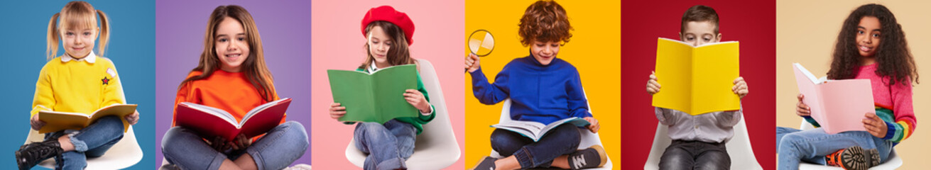 Fototapeta Happy pupils reading colorful books obraz