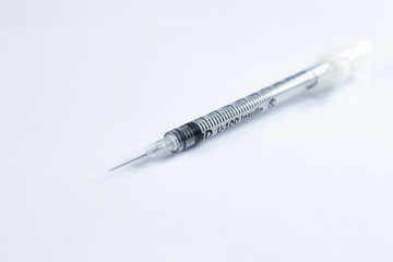 medical syringe for injection insulin on a white background