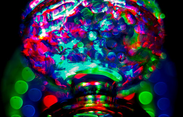 A glass of liquid. Glass. Color backlight.