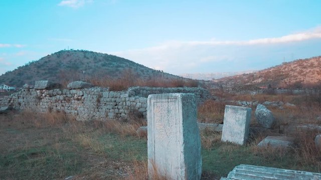 Ancient Inscriptions on Stone in the Old Roman City from the First Century of Doclea. Anticki zapisi na kamenu u Rimskom Gradu Duklji kod Podgorice