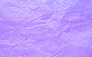 Rumpled paper texture purple. Texture of crumpled paper. Crumpled paper. Wrinkles paper
