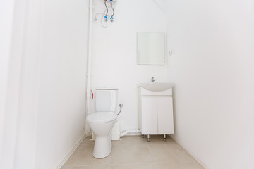 Fototapeta na wymiar small toilet in a small office