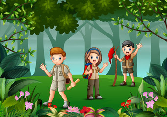 Group of scout are exploring the forest
