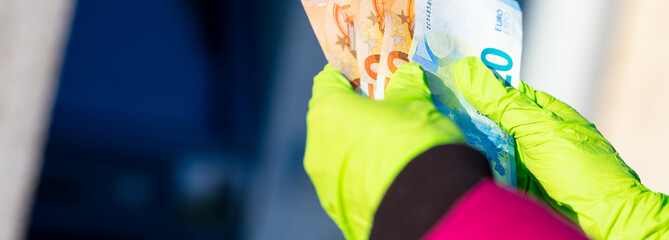 pandemic virus causes rationing of cash via ATM © Giulio_Fornasar