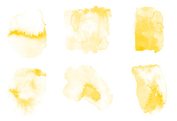 Set of yellow paint splashes isolated. Vector watercolor brushes