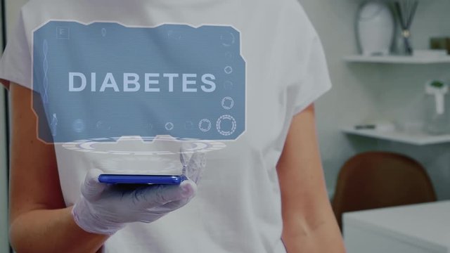 Doctor in medical glove against background of doctor's office with HUD hologram text Diabetes. Hand holds futuristic holographic gadget. Medical technology concept of the future
