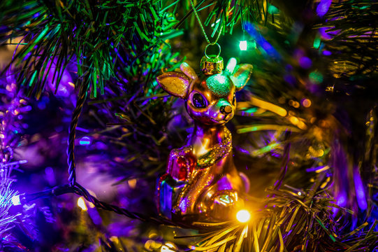 Christmas toy deer on a Christmas tree