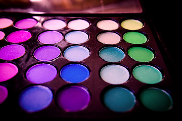 Color palette with eyeshadow powder