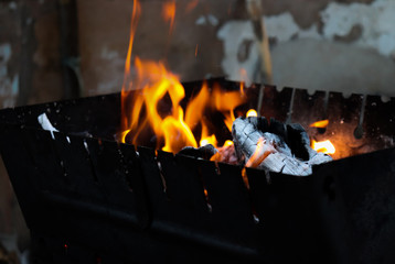 Hot coals burning in a grill