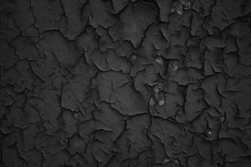 Black painting wall with crack