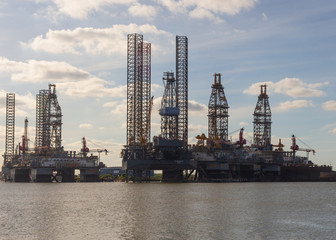 Fototapeta na wymiar Oil drilling platforms moored at the Port of Galveston for repairs