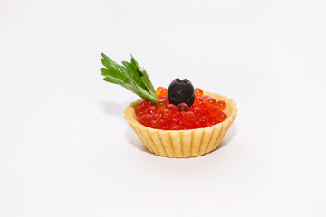 red caviar in tartlets close up on a white background