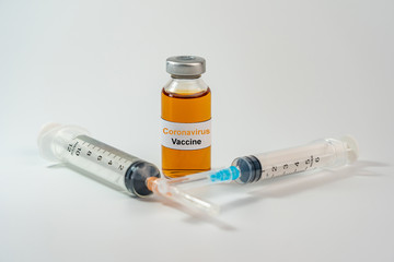 Coronavirus vaccine bottle and medical syringe injection