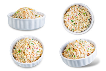 Canned Tuna red onion egg salad on a white isolated background