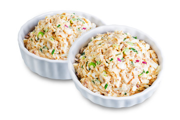 Canned Tuna red onion egg salad on a white isolated background