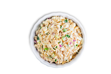 Canned Tuna red onion egg salad on a white isolated background