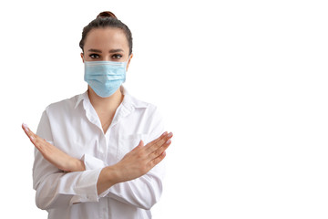 Female doctor or nurse isolate in a mask on a white background. Stop COVID-19