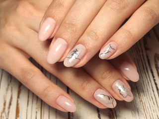 stylish design of manicure on beautiful nails