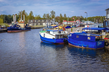 Vessels in Leba town port over Baltic Sea, Poland - obrazy, fototapety, plakaty