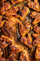 Grilled chicken wings in barbecue sauce