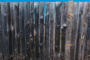 vertical wooden old plank fence 
