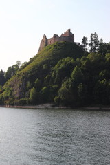  Castle on a rock by the lake - obrazy, fototapety, plakaty