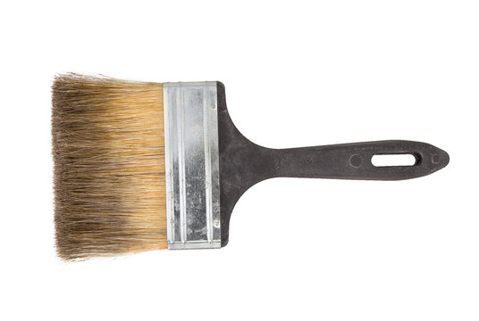 Decorator brush isolated on white background. Wide paintbrush usually used for painting walls, furniture and steel surfaces. Masonry brush with plastic handle and long bristles.