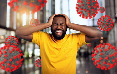 Sad and desperate expression of a boy who is scared to catch the covid-19 coronavirus. Cyan...