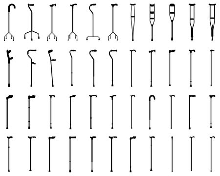 Black silhouettes of walking sticks and crutches on a white background