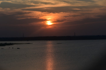 Obraz premium Beautiful sunset above the sea