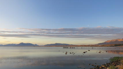 Puerto Natales, Patagonia, Chile: Ultima Esperanza (Last Hope) fjord, sunset and Muelle Viejo (historic pier)