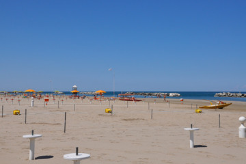 Empty beach with umbrellas. uninhabited landscape, quarantine