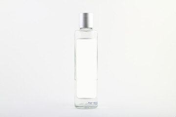 Bottle of cologne isolated over a white background.	
