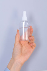 Close up woman hands using hands sanitizer alcohol gel