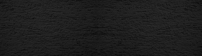 Black anthracite rough plaster facade texture background banner panorama
